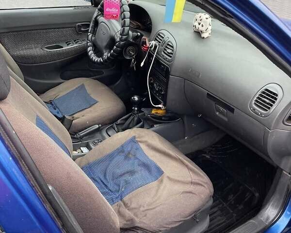 Синий Дэу Нубира, объемом двигателя 1.6 л и пробегом 444 тыс. км за 1900 $, фото 5 на Automoto.ua