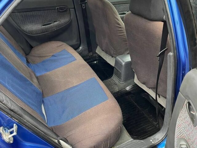 Синий Дэу Нубира, объемом двигателя 1.6 л и пробегом 444 тыс. км за 1900 $, фото 3 на Automoto.ua