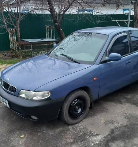 Синий Дэу Нубира, объемом двигателя 1.6 л и пробегом 430 тыс. км за 2200 $, фото 2 на Automoto.ua