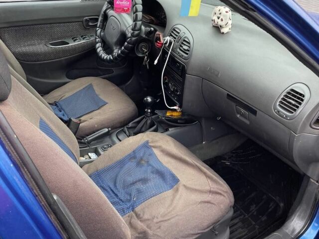 Синий Дэу Нубира, объемом двигателя 1.6 л и пробегом 444 тыс. км за 1900 $, фото 6 на Automoto.ua