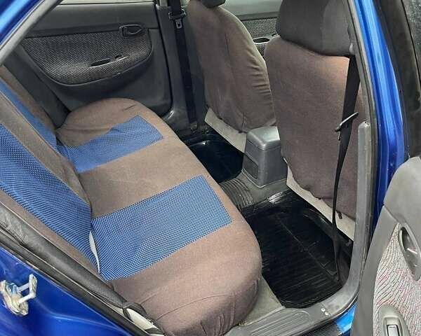 Синий Дэу Нубира, объемом двигателя 1.6 л и пробегом 444 тыс. км за 1900 $, фото 2 на Automoto.ua