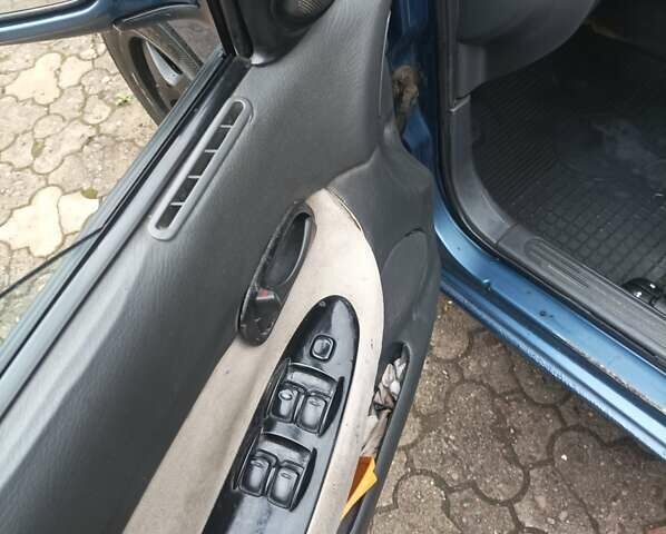 Синий Дэу Нубира, объемом двигателя 1.6 л и пробегом 310 тыс. км за 1800 $, фото 4 на Automoto.ua