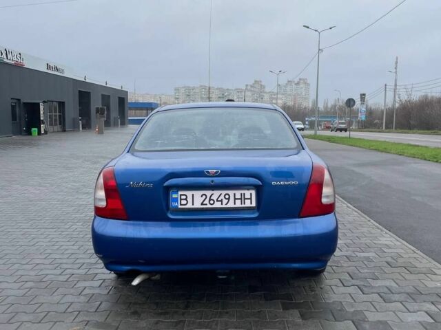 Синий Дэу Нубира, объемом двигателя 1.6 л и пробегом 444 тыс. км за 1900 $, фото 2 на Automoto.ua