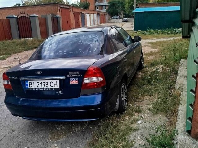 Синій Деу Нубіра, об'ємом двигуна 2 л та пробігом 200 тис. км за 1390 $, фото 3 на Automoto.ua