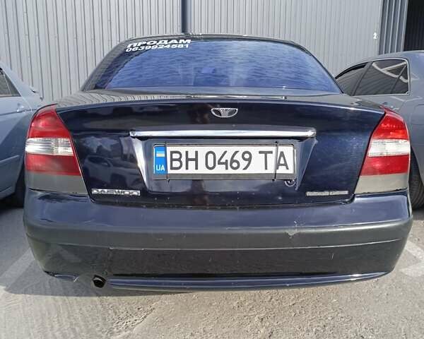 Синий Дэу Нубира, объемом двигателя 2 л и пробегом 180 тыс. км за 3000 $, фото 30 на Automoto.ua