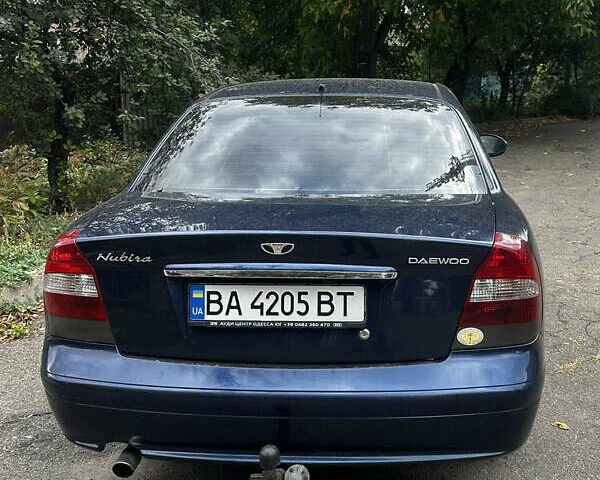 Синий Дэу Нубира, объемом двигателя 2 л и пробегом 229 тыс. км за 3100 $, фото 3 на Automoto.ua