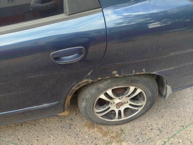 Синій Деу Нубіра, об'ємом двигуна 2 л та пробігом 200 тис. км за 1390 $, фото 6 на Automoto.ua