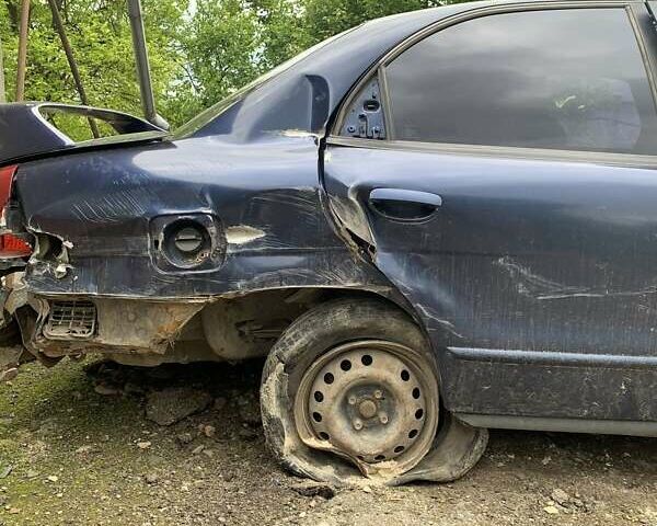 Синій Деу Нубіра, об'ємом двигуна 2 л та пробігом 260 тис. км за 500 $, фото 4 на Automoto.ua