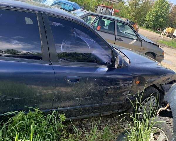 Синій Деу Нубіра, об'ємом двигуна 2 л та пробігом 260 тис. км за 500 $, фото 11 на Automoto.ua