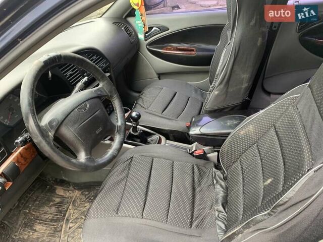 Синій Деу Нубіра, об'ємом двигуна 2 л та пробігом 260 тис. км за 500 $, фото 8 на Automoto.ua