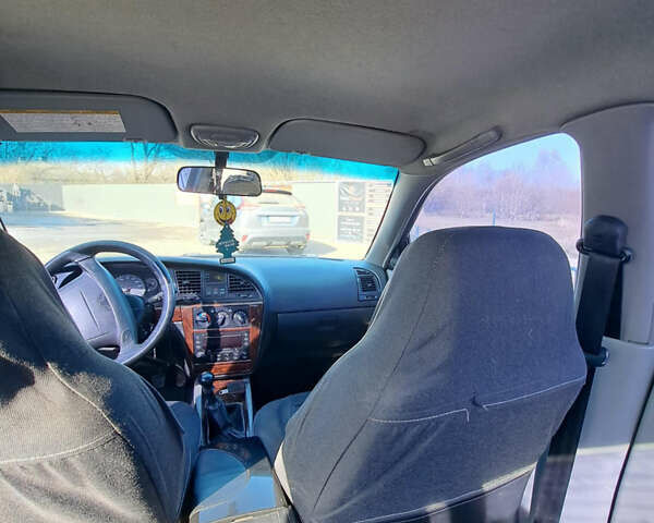 Синий Дэу Нубира, объемом двигателя 2 л и пробегом 260 тыс. км за 2200 $, фото 5 на Automoto.ua