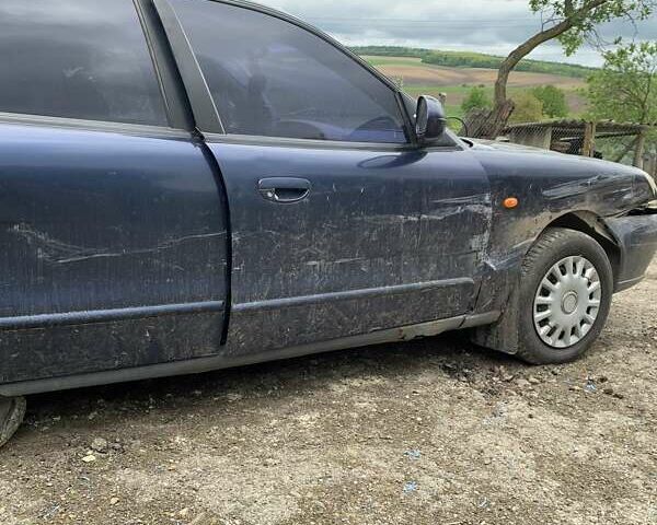 Синій Деу Нубіра, об'ємом двигуна 2 л та пробігом 260 тис. км за 500 $, фото 5 на Automoto.ua