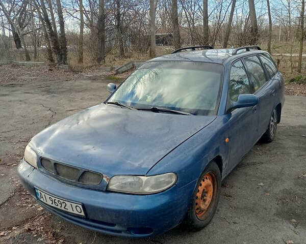 Синий Дэу Нубира, объемом двигателя 2 л и пробегом 380 тыс. км за 1300 $, фото 11 на Automoto.ua