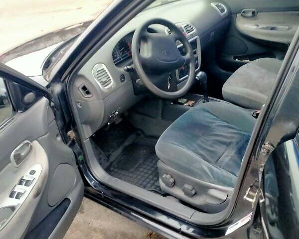 Синий Дэу Нубира, объемом двигателя 2 л и пробегом 292 тыс. км за 3500 $, фото 5 на Automoto.ua