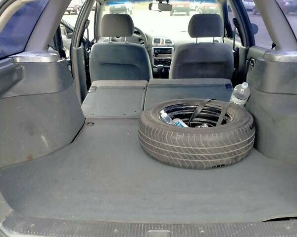 Синий Дэу Нубира, объемом двигателя 2 л и пробегом 292 тыс. км за 3500 $, фото 8 на Automoto.ua