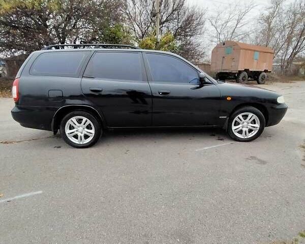 Синий Дэу Нубира, объемом двигателя 2 л и пробегом 292 тыс. км за 3500 $, фото 11 на Automoto.ua