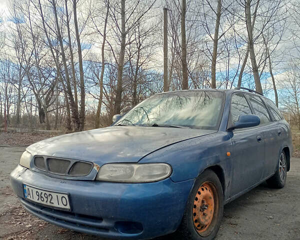 Синий Дэу Нубира, объемом двигателя 2 л и пробегом 380 тыс. км за 1300 $, фото 14 на Automoto.ua