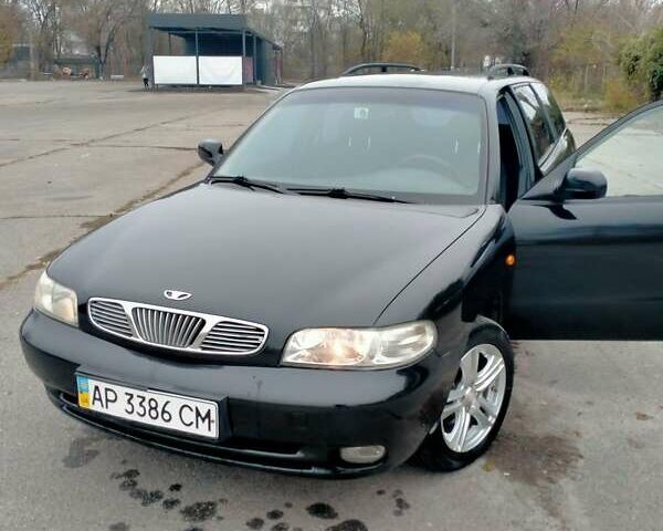 Синий Дэу Нубира, объемом двигателя 2 л и пробегом 292 тыс. км за 3500 $, фото 2 на Automoto.ua