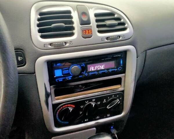 Синий Дэу Нубира, объемом двигателя 2 л и пробегом 292 тыс. км за 3500 $, фото 3 на Automoto.ua