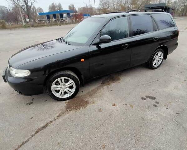 Синий Дэу Нубира, объемом двигателя 2 л и пробегом 292 тыс. км за 3500 $, фото 14 на Automoto.ua