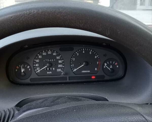 Синій Деу Нубіра, об'ємом двигуна 1.6 л та пробігом 275 тис. км за 1399 $, фото 2 на Automoto.ua