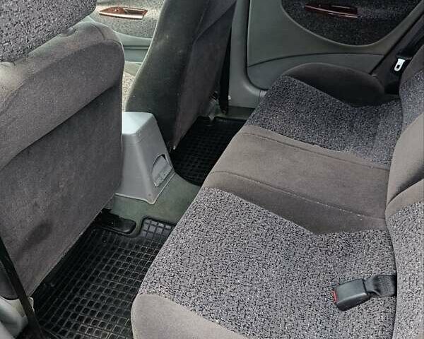 Синий Дэу Нубира, объемом двигателя 2 л и пробегом 312 тыс. км за 2200 $, фото 6 на Automoto.ua