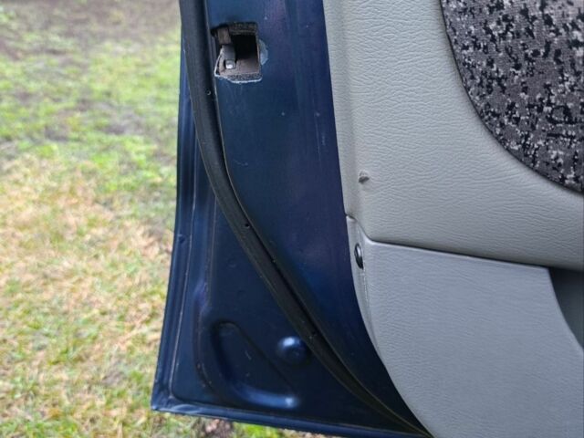 Синій Деу Нубіра, об'ємом двигуна 2 л та пробігом 312 тис. км за 2200 $, фото 2 на Automoto.ua