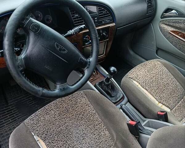 Синий Дэу Нубира, объемом двигателя 2 л и пробегом 312 тыс. км за 2200 $, фото 7 на Automoto.ua