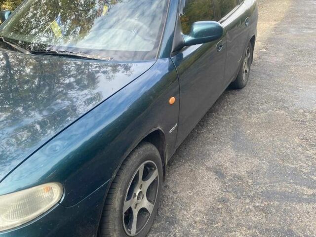 Зеленый Дэу Нубира, объемом двигателя 2 л и пробегом 240 тыс. км за 1700 $, фото 2 на Automoto.ua