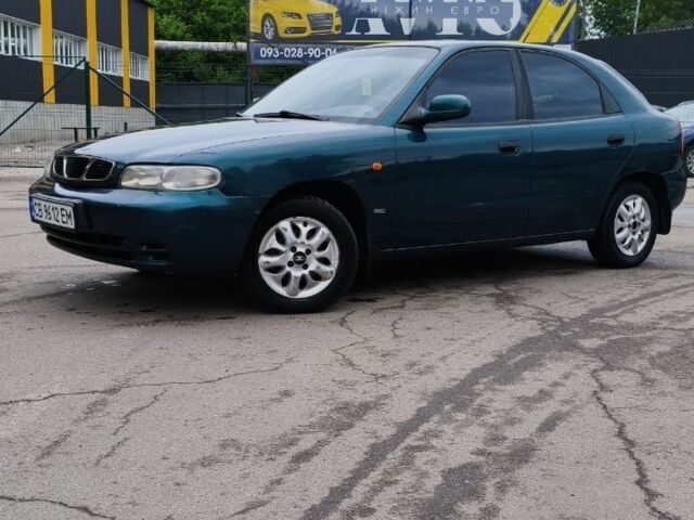 Зелений Деу Нубіра, об'ємом двигуна 1.6 л та пробігом 210 тис. км за 1999 $, фото 4 на Automoto.ua