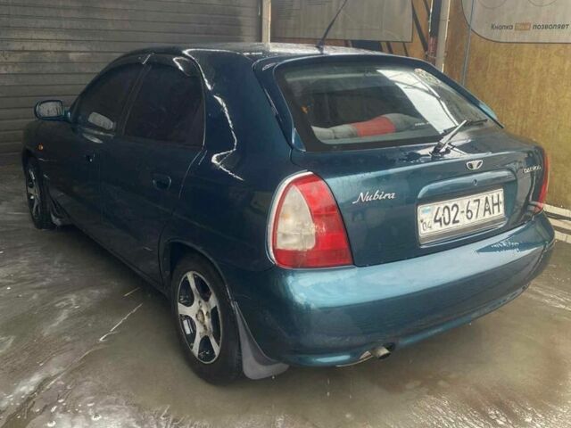 Зеленый Дэу Нубира, объемом двигателя 2 л и пробегом 240 тыс. км за 1700 $, фото 4 на Automoto.ua