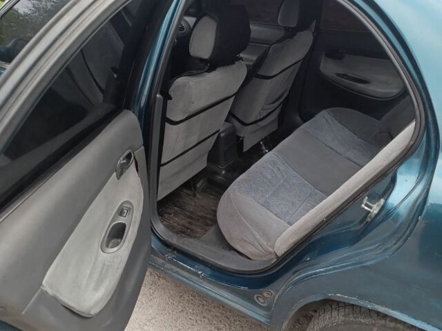 Зеленый Дэу Нубира, объемом двигателя 2 л и пробегом 435 тыс. км за 1700 $, фото 4 на Automoto.ua