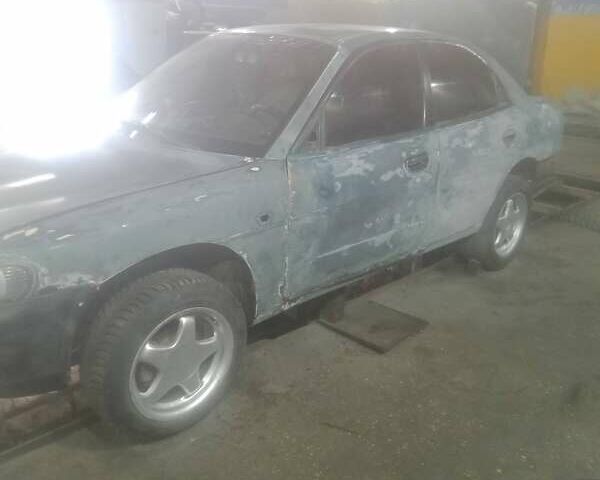 Зеленый Дэу Нубира, объемом двигателя 1.6 л и пробегом 190 тыс. км за 2300 $, фото 29 на Automoto.ua