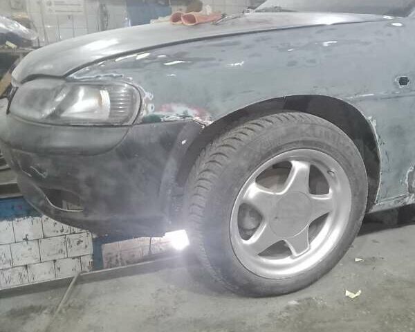 Зеленый Дэу Нубира, объемом двигателя 1.6 л и пробегом 190 тыс. км за 2300 $, фото 12 на Automoto.ua