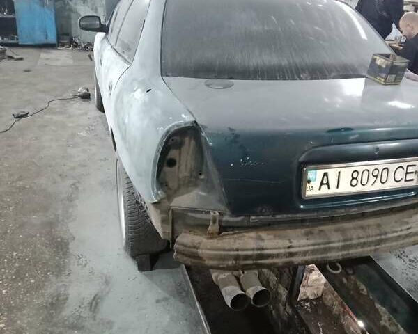 Зеленый Дэу Нубира, объемом двигателя 1.6 л и пробегом 190 тыс. км за 2300 $, фото 19 на Automoto.ua