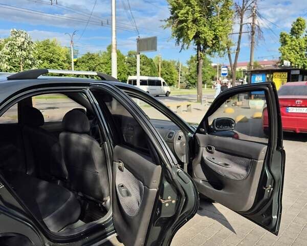 Зеленый Дэу Нубира, объемом двигателя 2 л и пробегом 220 тыс. км за 2200 $, фото 15 на Automoto.ua