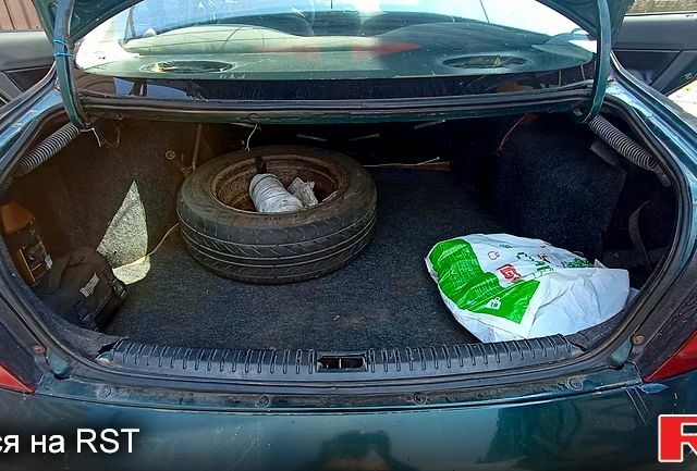 Зеленый Дэу Нубира, объемом двигателя 1.6 л и пробегом 435 тыс. км за 1600 $, фото 5 на Automoto.ua