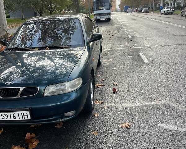 Зеленый Дэу Нубира, объемом двигателя 1.6 л и пробегом 214 тыс. км за 1600 $, фото 2 на Automoto.ua