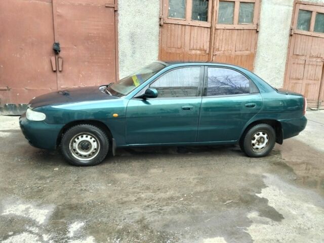 Зеленый Дэу Нубира, объемом двигателя 1.6 л и пробегом 300 тыс. км за 1662 $, фото 3 на Automoto.ua