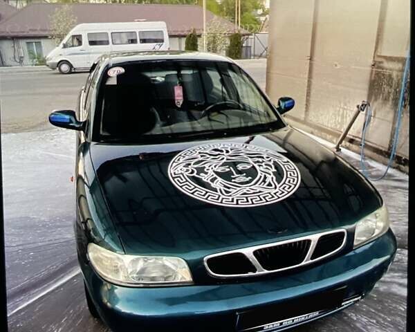 Зеленый Дэу Нубира, объемом двигателя 1.6 л и пробегом 280 тыс. км за 1950 $, фото 3 на Automoto.ua