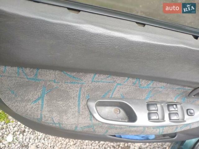 Зеленый Дэу Нубира, объемом двигателя 1.6 л и пробегом 256 тыс. км за 750 $, фото 12 на Automoto.ua