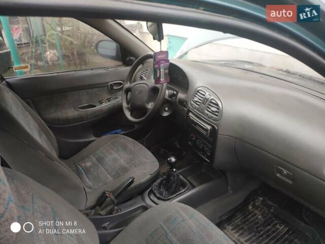 Зеленый Дэу Нубира, объемом двигателя 1.6 л и пробегом 256 тыс. км за 750 $, фото 14 на Automoto.ua