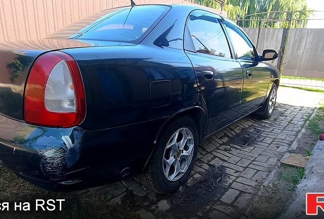 Зеленый Дэу Нубира, объемом двигателя 1.6 л и пробегом 435 тыс. км за 1600 $, фото 2 на Automoto.ua