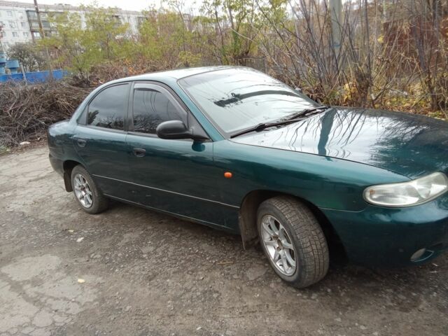 Зелений Деу Нубіра, об'ємом двигуна 2 л та пробігом 240 тис. км за 1313 $, фото 1 на Automoto.ua