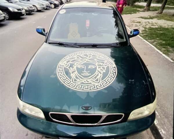 Зеленый Дэу Нубира, объемом двигателя 1.6 л и пробегом 280 тыс. км за 1950 $, фото 1 на Automoto.ua