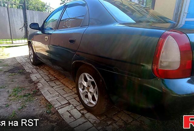 Зеленый Дэу Нубира, объемом двигателя 1.6 л и пробегом 435 тыс. км за 1600 $, фото 3 на Automoto.ua