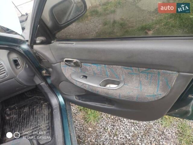 Зеленый Дэу Нубира, объемом двигателя 1.6 л и пробегом 256 тыс. км за 750 $, фото 10 на Automoto.ua