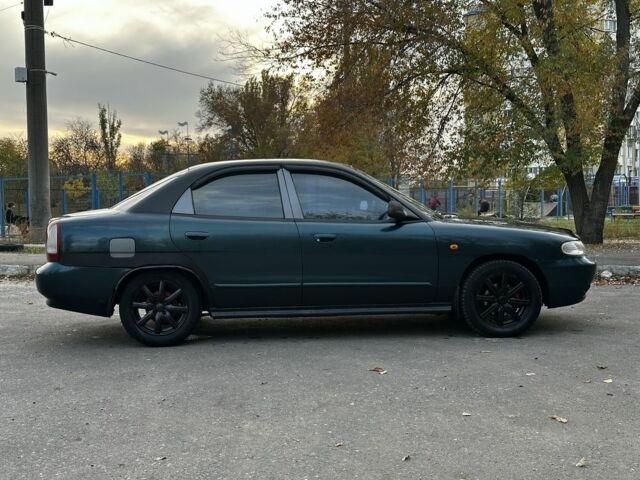 Зеленый Дэу Нубира, объемом двигателя 1.6 л и пробегом 255 тыс. км за 1599 $, фото 7 на Automoto.ua