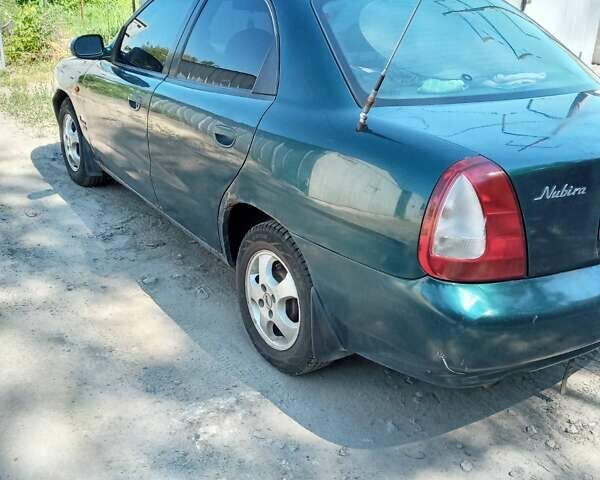 Зеленый Дэу Нубира, объемом двигателя 1.6 л и пробегом 260 тыс. км за 1300 $, фото 4 на Automoto.ua