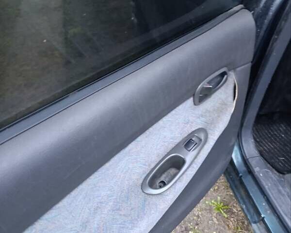 Зеленый Дэу Нубира, объемом двигателя 1.6 л и пробегом 375 тыс. км за 1200 $, фото 17 на Automoto.ua